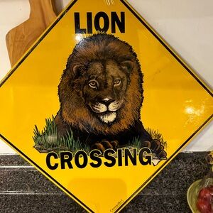Lion Crossing Retro-Vintage yellow sign. New in shrink wrap